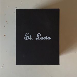 A brand new rose gold watch in the box